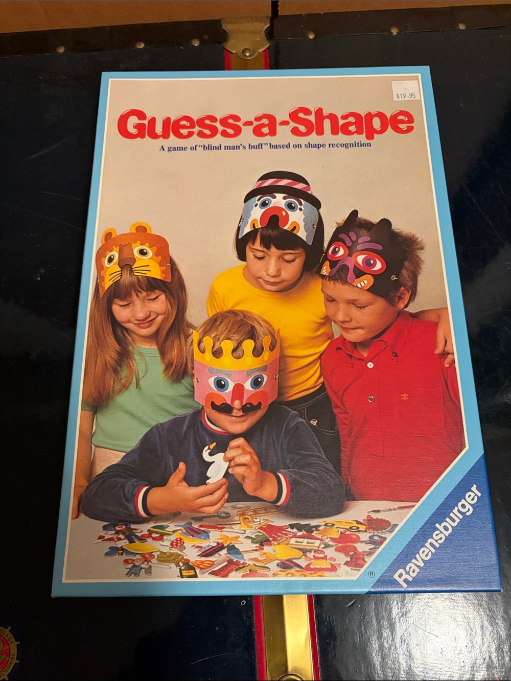 Ravensburger Guess-a-Shape Game Box with Bright Red and Blue Accents